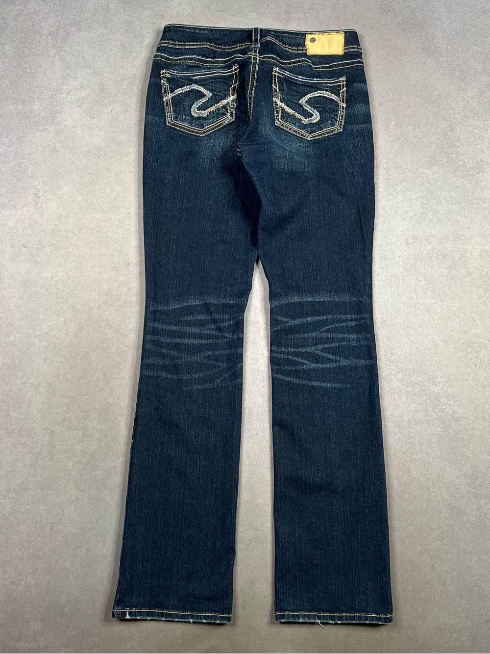 Silver Jeans Dark Indigo Flare Jeans with Embroidered Back Pockets